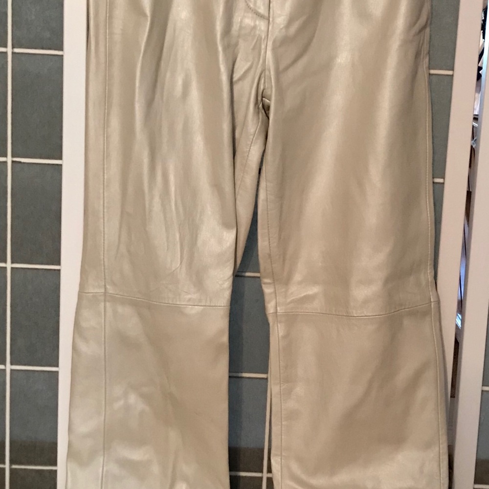 100% soft leather, lined, unfinished hem
